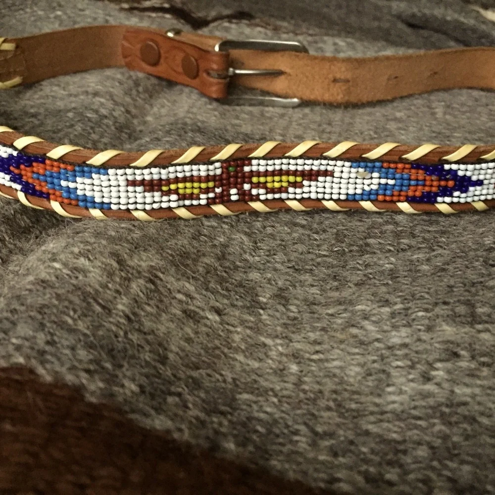 Vintage beaded belt size 26. Firebird design.